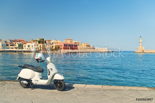 Bild på travel image of retro scooter in old greek town